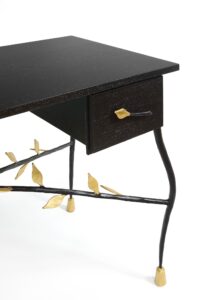 Close-up of the drawer of the Garouste Bonetti leather desk, in dark wood and brown wrought iron and gold leaf